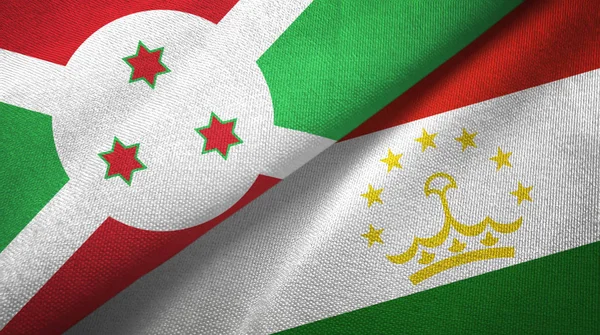 Burundi y Tayikistán dos banderas tela textil, textura de la tela — Foto de Stock
