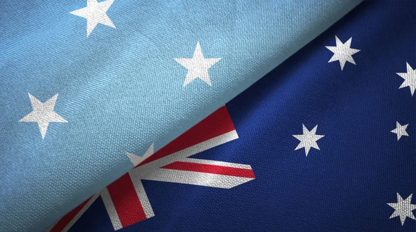 Micronesia and Australia two flags textile cloth, fabric texture — Stock Photo, Image