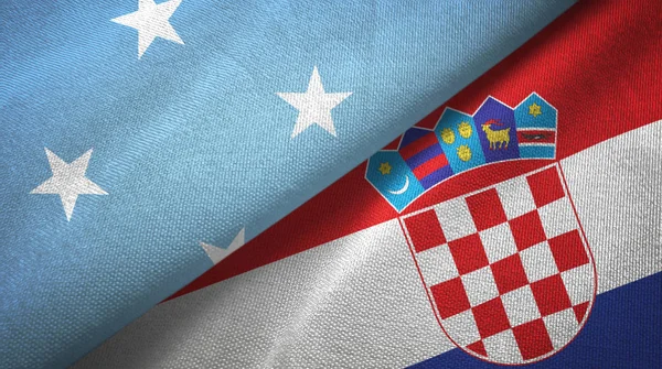 Micronesia y Croacia dos banderas tela textil, textura de la tela — Foto de Stock