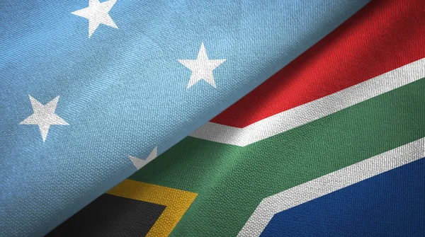 Micronesia and South Africa two flags textile cloth, fabric texture — Stock Photo, Image