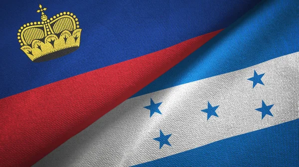 Liechtenstein en Honduras twee vlaggen textiel doek, weefsel textuur — Stockfoto