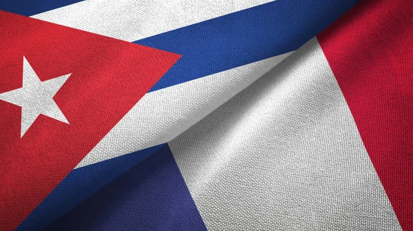 Cuba e França duas bandeiras de pano têxtil, textura de tecido — Fotografia de Stock