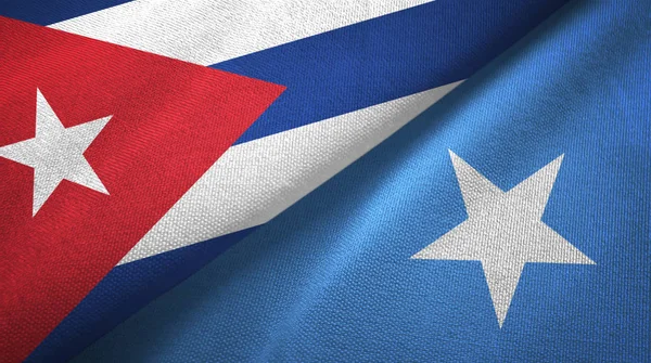 Cuba e Somália duas bandeiras de pano têxtil, textura de tecido — Fotografia de Stock