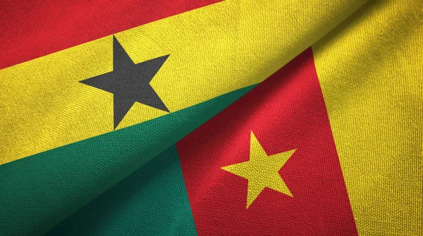 Ghána és Kamerun két zászló textil ruhával, szövet textúra — Stock Fotó