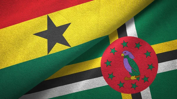 Ghana et Dominique deux drapeaux tissu textile, texture du tissu — Photo
