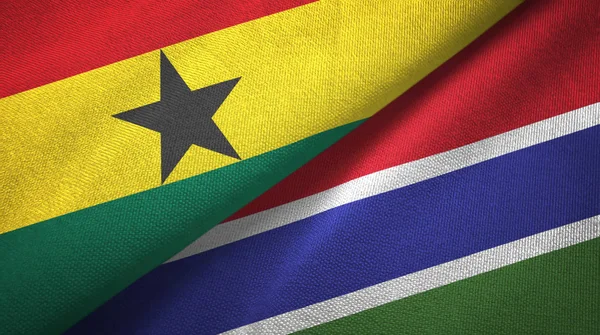 Ghana och Gambia två flaggor textil trasa, tyg konsistens — Stockfoto