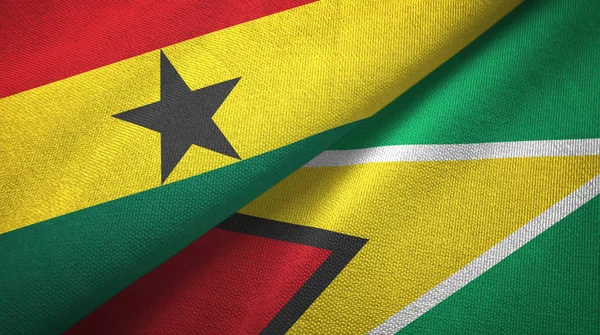 Ghana- und Guyana-Flaggen Textilstoff, Textur — Stockfoto