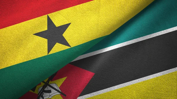 Ghana och Moçambique två flaggor textil trasa, tyg konsistens — Stockfoto