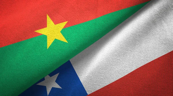 Burkina Faso en Chili twee vlaggen textiel doek, weefsel textuur — Stockfoto