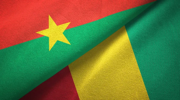 Burkina Faso and Guinea two flags textile cloth, fabric texture — Stock Photo, Image