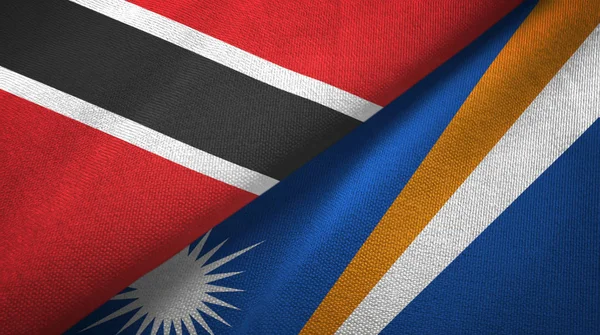 トリニダード・トバゴとマーシャル諸島の2つの旗織物布、生地の質感 — ストック写真