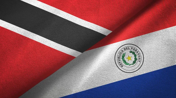 Trinidad and Tobago and Paraguay two flags textile cloth, fabric texture — Stock Photo, Image