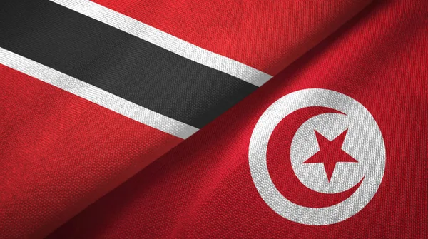Trinité-et-Tobago et Tunisie deux drapeaux tissu textile, texture du tissu — Photo