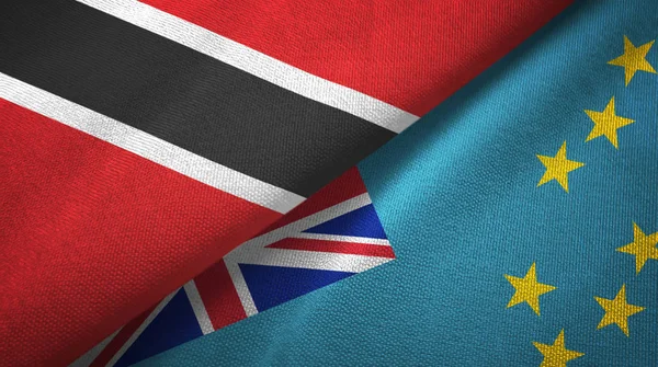 Trinidad y Tobago y Tuvalu dos banderas de tela textil, textura de tela — Foto de Stock