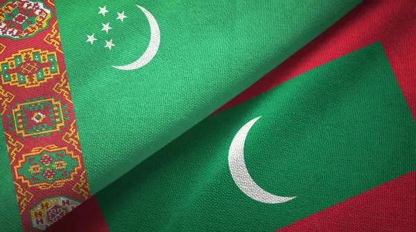 Türkmenistan ve Maldivler iki bayrak tekstil kumaş, kumaş doku — Stok fotoğraf