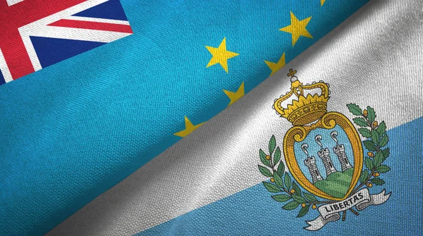 Tuvalu e San Marino duas bandeiras de pano têxtil, textura de tecido — Fotografia de Stock