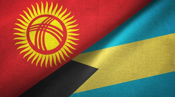 Kirguistán y Bahamas dos banderas tela textil, textura de la tela — Foto de Stock