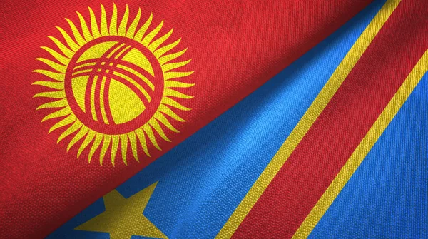 Kirghizistan e Repubblica Democratica del Congo due bandiere tessuto — Foto Stock