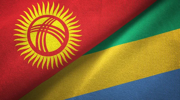 Kirguistán y Gabón dos banderas tela textil, textura de la tela — Foto de Stock