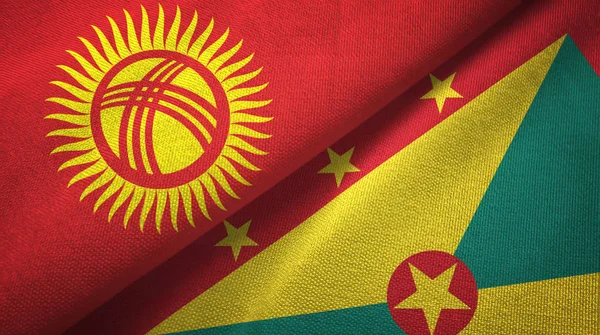 Kirguistán y Granada dos banderas tela textil, textura de la tela — Foto de Stock