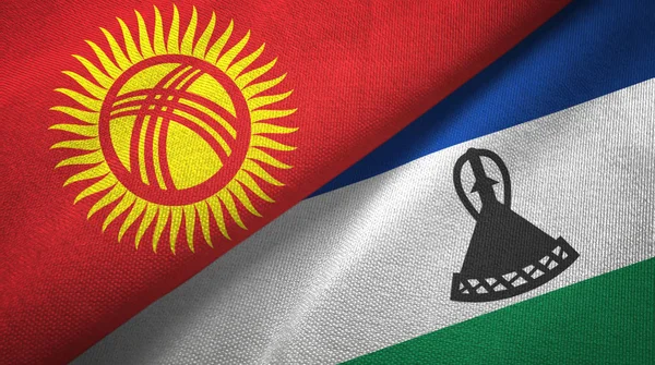 Kirguistán y Lesoto dos banderas tela textil, textura de la tela — Foto de Stock