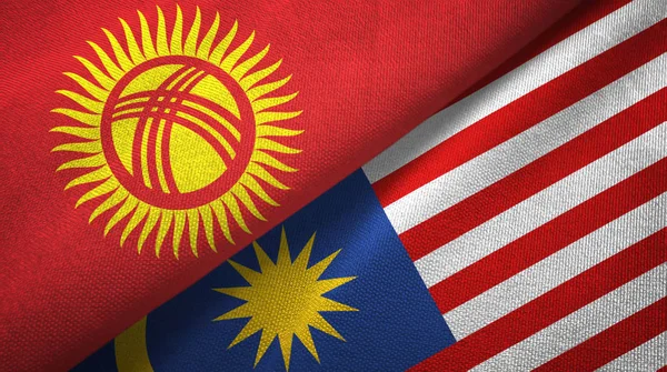 Kirguistán y Malasia dos banderas tela textil, textura de la tela — Foto de Stock