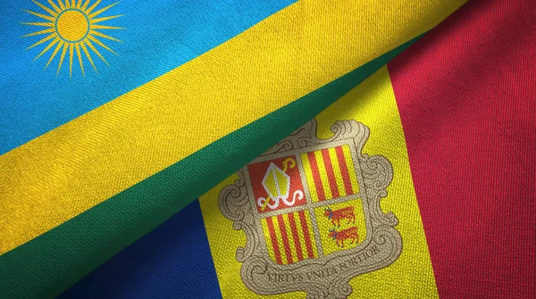 Rwanda och Andorra två flaggor textil trasa, tyg konsistens — Stockfoto