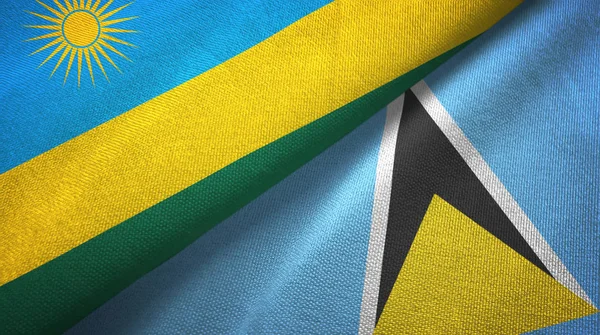 Ruanda és Saint Lucia két zászló textilszövet, szövet textúra — Stock Fotó