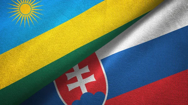 Руандійський і Словаччина два прапори текстильна тканина, текстура тканини — стокове фото