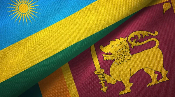 Rwanda och Sri Lanka två flaggor textil tyg, tyg konsistens — Stockfoto