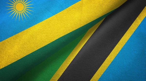 Ruanda und Tansania zwei Flaggen Textilstoff, Textur — Stockfoto