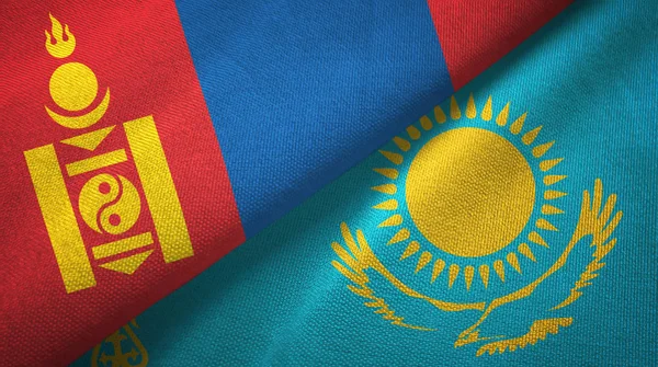 Mongolia y Kazajstán dos banderas tela textil, textura de la tela — Foto de Stock