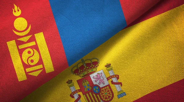 Mongólia e Espanha duas bandeiras de pano têxtil, textura de tecido — Fotografia de Stock
