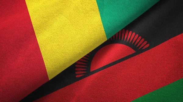 Guinea e Malawi due bandiere tessuto, tessitura tessuto — Foto Stock