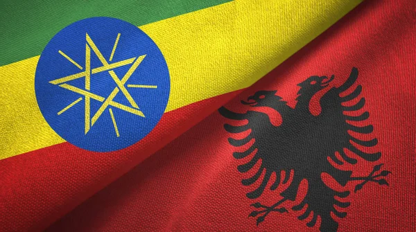 Etiopie a Albánie dvě vlajky textilní tkaniny, textura textilií — Stock fotografie
