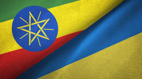 Эфиопия и Украина два флага текстильная ткань, тканевая текстура
