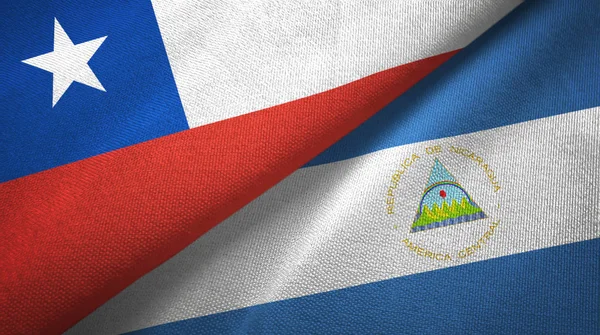 Chili en Nicaragua twee vlaggen textiel doek, weefsel textuur — Stockfoto