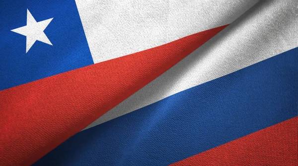 Chile y Rusia dos banderas de tela textil, textura de tela —  Fotos de Stock