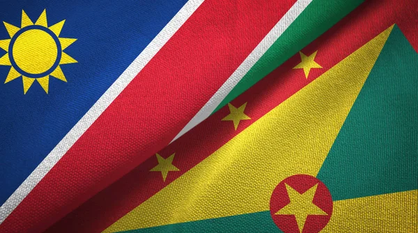 Namibia y Granada dos banderas tela textil, textura de la tela —  Fotos de Stock