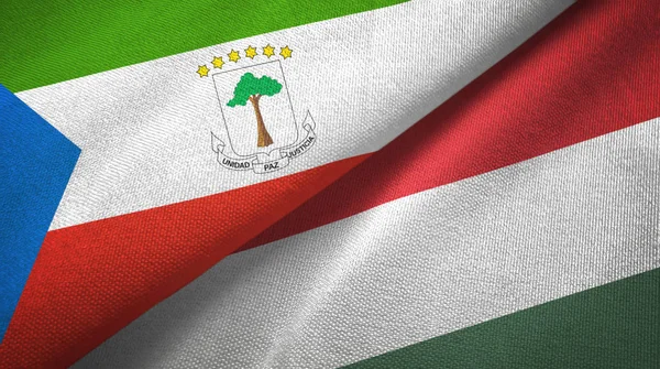Ekvatorialguinea och Ungern två flaggor textil trasa, tyg konsistens — Stockfoto