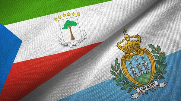 Guinea Ecuatorial y San Marino dos banderas tela textil, textura de la tela — Foto de Stock