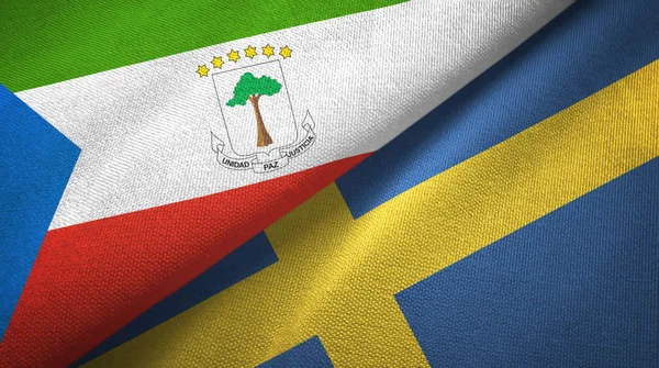 Äquatorialguinea und Schweden zwei Flaggen Textilstoff, Textur — Stockfoto