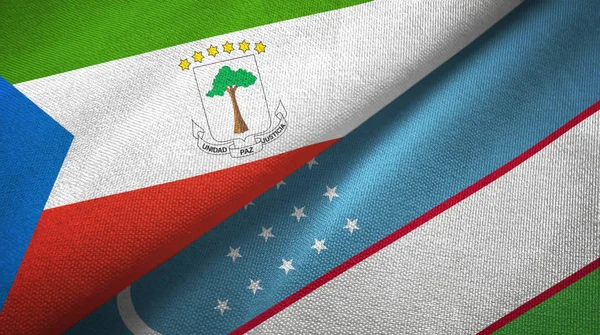 Guinea Ecuatorial y Uzbekistán dos banderas tela textil, textura de la tela — Foto de Stock