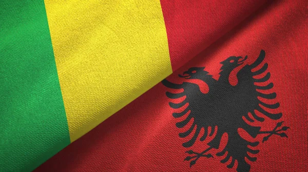 Mali en Albanië twee vlaggen textiel doek, weefsel textuur — Stockfoto