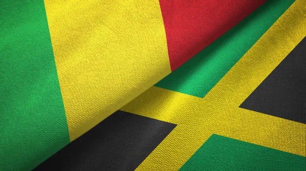 Malí y Jamaica dos banderas de tela textil, textura de la tela —  Fotos de Stock