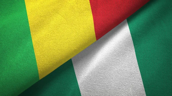 Mali och Nigeria två flaggor textil tyg, tyg konsistens — Stockfoto