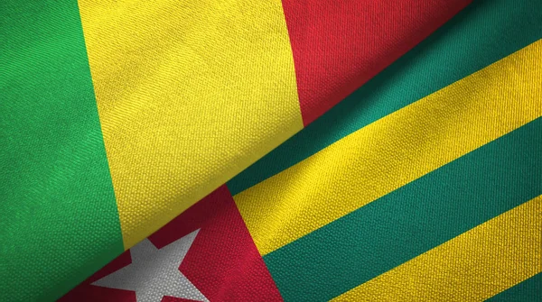 Mali és Togo két zászlók textil ruhával, szövet textúra — Stock Fotó
