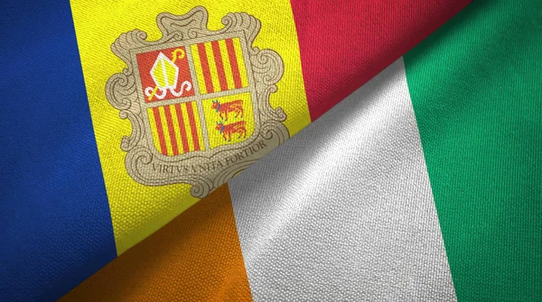 Andorra och Cote Divoire Ivory Coast två flaggor textil tyg textur — Stockfoto