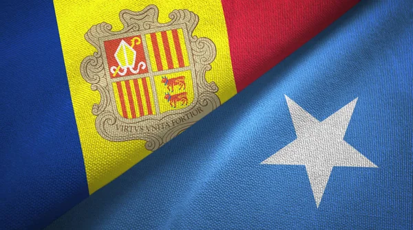Andorra y Somalia dos banderas de tela textil, textura de tela — Foto de Stock