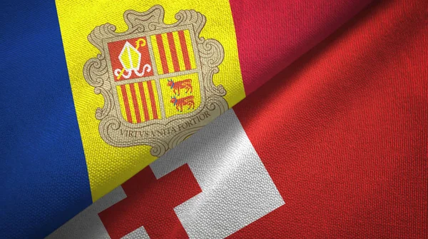 Andorra e Tonga duas bandeiras pano têxtil, textura de tecido — Fotografia de Stock